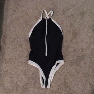 Black and white zip up one piece